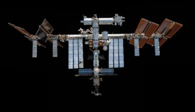 a space station hangs in black