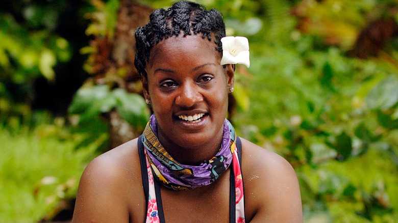 Cirie talking with a flower behind her ear on Survivor