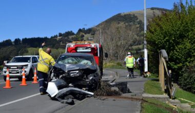 Driver hurt as car smashes through fence in Mosgiel