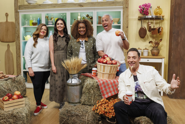 Alex Guarnaschelli, Katie Lee Biegel, Sunny Anderson, Geoffrey Zakarian and Jeff Mauro pose for a group photo, as seen on The Kitchen, Season 40.