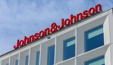 Johnson & Johnson building exterior with large red logo on modern white facade