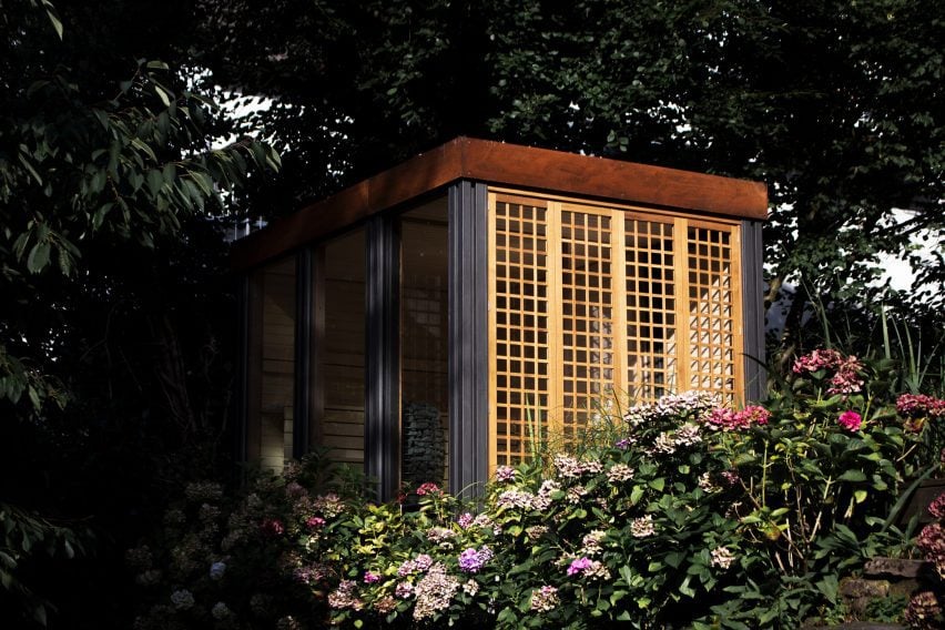 Sauna behind flowers