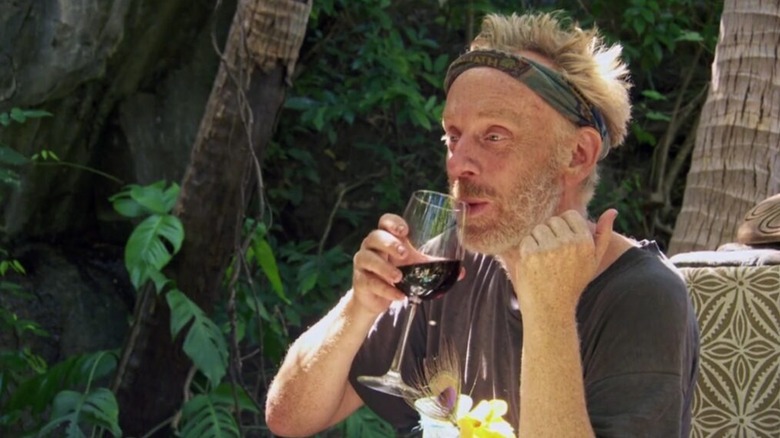 Mike White drinking wine after a reward challenge on Survivor