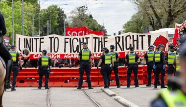 Australian police hit with rocks, bottles at protest in Melbourne