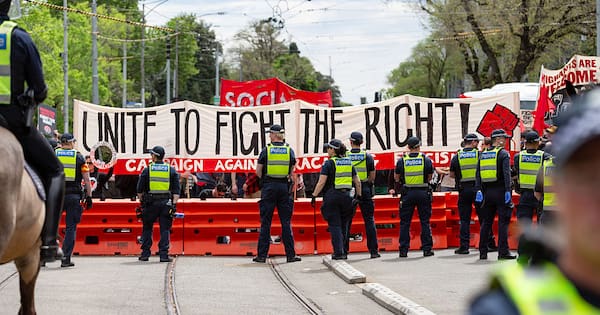 Australian police hit with rocks, bottles at protest in Melbourne