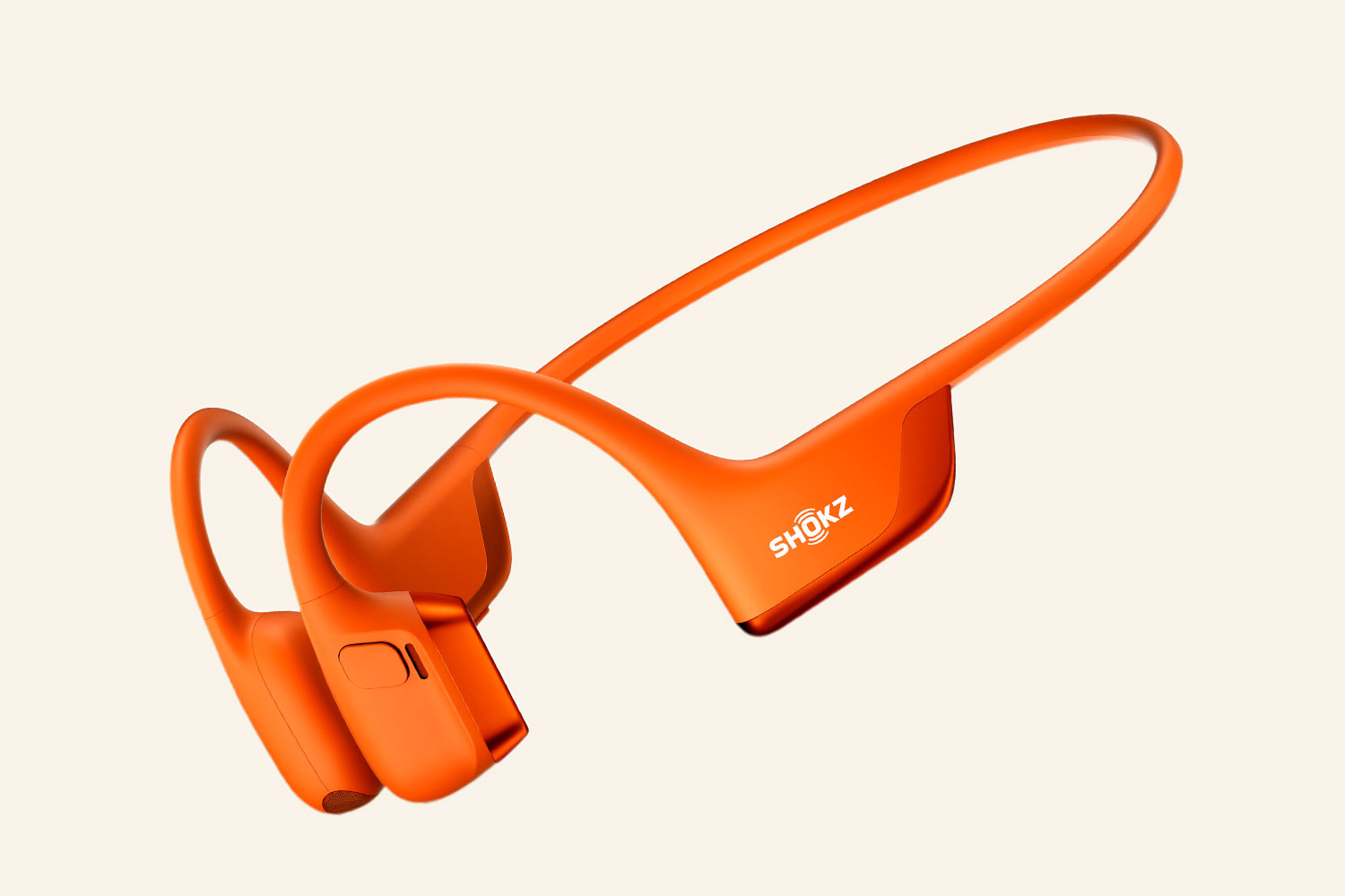 Orange Shokz bone conduction headphones.