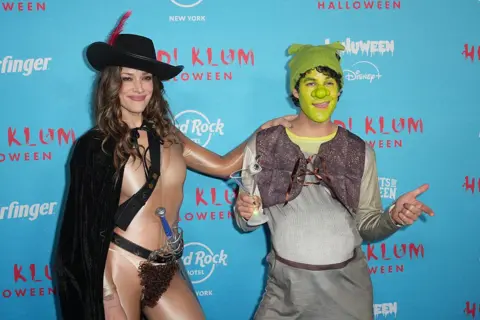 Getty Images Glee star Darren Criss wife and his Mia Swier went for a Shrek theme
