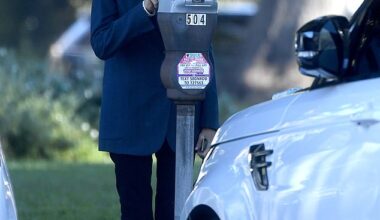 Lovely Barbara feeds the meter in Beverly Hills during a trip into town for a meeting