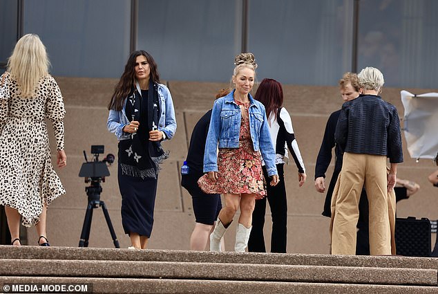 Janette wore a brightly-coloured floral mini dress, paired with a denim jacket and cowboy boots for the filming day