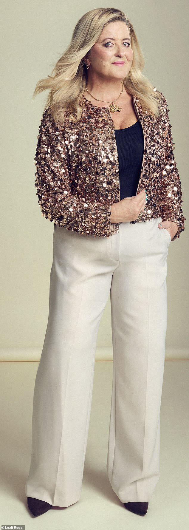CHATGPT OUTFIT CHOICE: Susannah in a gold sparkly jacket from M&S (£52), which the AI pairs with a pair of heavy cream, wide-leg tailored trousers (£46) from the same shop