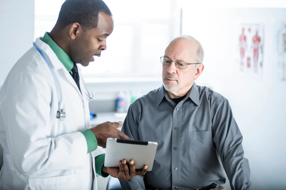 Doctor talking to a patient in an office