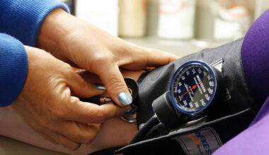 A nurse takes someones blood pressure inside of the East Arkansas Family Health Center in Lepanto