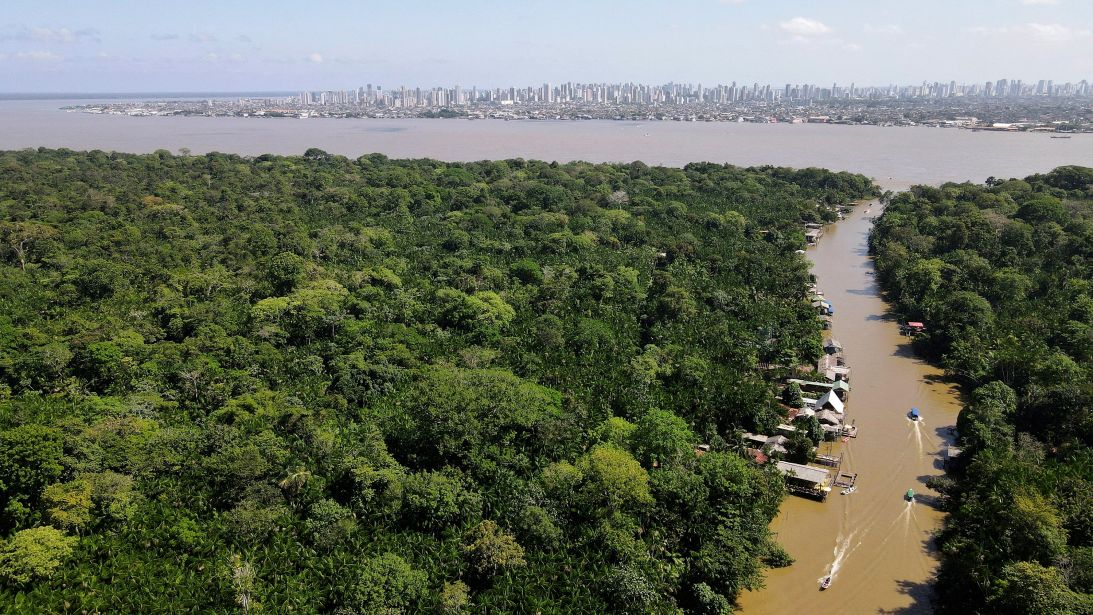 The Amazon rainforest with the city of Belém, in the background on August 10, 2025. Brazil has approved exploratory oil drilling at the mouth of the Amazon, only a few hundred miles from Belém, where delegates are gathering for the COP30 climate conference.