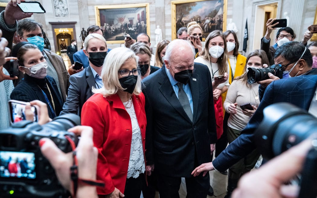 Cheney walks with his daughter Rep. Liz Cheney through the Capitol in January 2022, the one year anniversary of the Capitol insurrection.