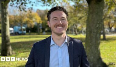 RSF commander Mohamed Hamdan Dagalo in military uniform and wearing sunglasses