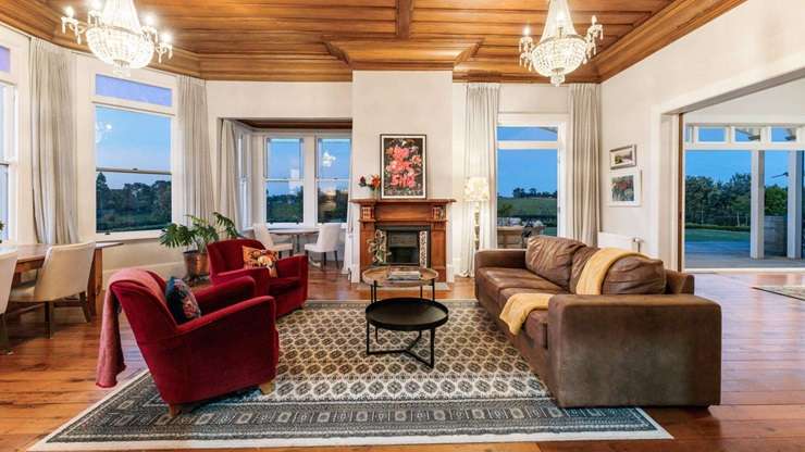 Huntly House, at 111 Wharf Road, in Clarks Beach, Franklin, started life in Palmerston North. Photo / Supplied