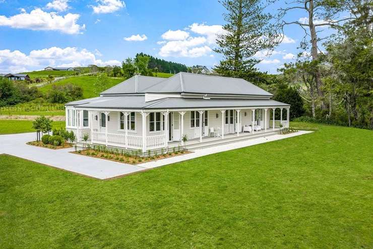 Huntly House, at 111 Wharf Road, in Clarks Beach, Franklin, started life in Palmerston North. Photo / Supplied