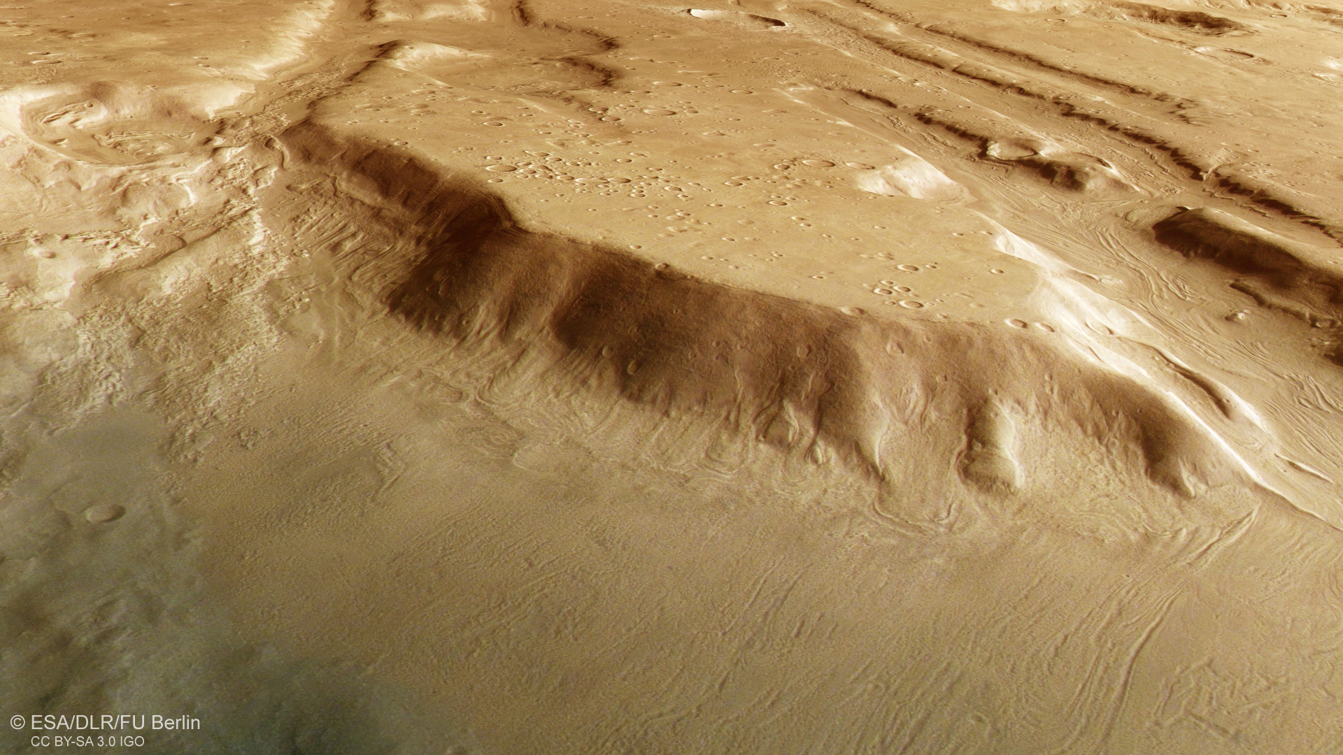 a large ridge on a reddish-orange landscape