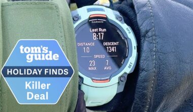 Garmin Instinct 3 close-up on the author's wrist while snowboarding