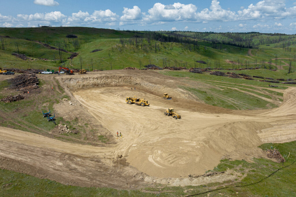 An aerial view of the 22-foot pit used for the biomass burial site. Credit: Mast Reforestation