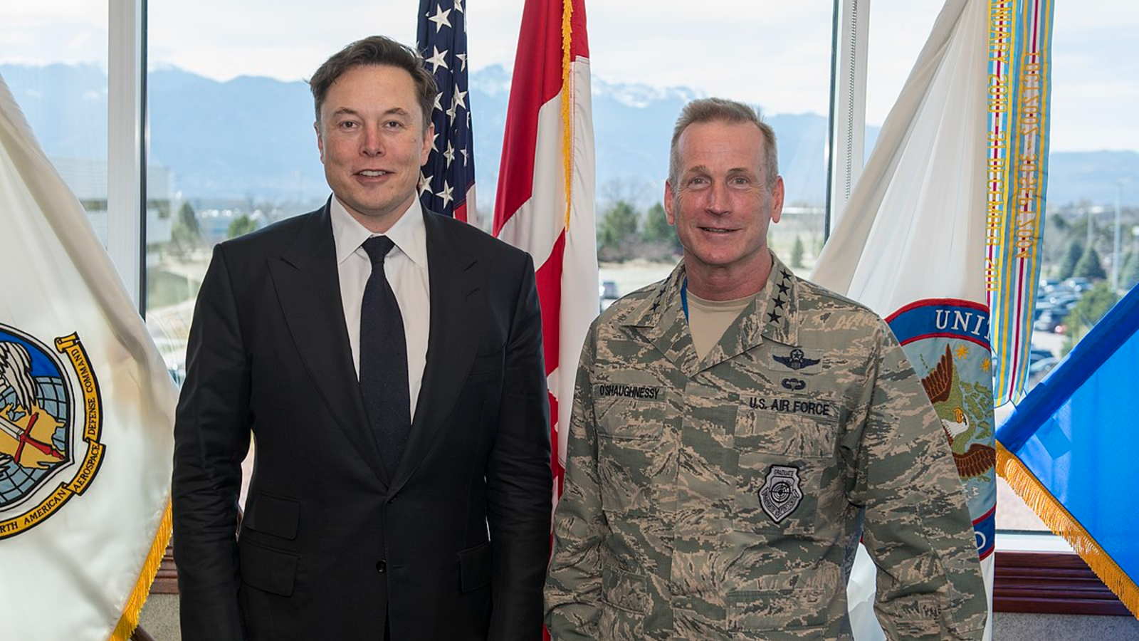 A photo of Elon Musk stood next to a U.S. general