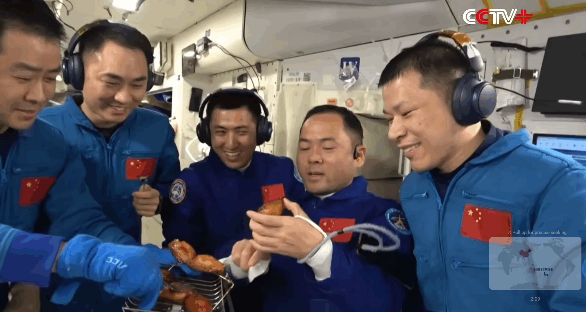 Screenshot of the CCTV video showing the crew of the Tiangong-1 space station enjoying the first bbq in space. Credit: CCTV
