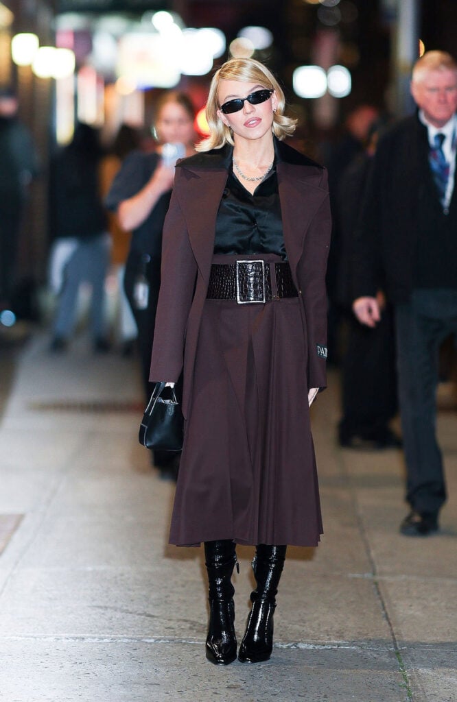 Sydney Sweeney, Patou Fall 2025, brown coat look, New York street style, celebrity press tour fashion, tonal dressing