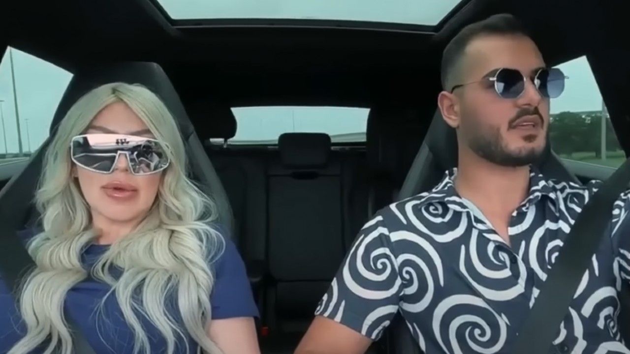 Tigerlily and Adnan in the car after he arrived in the United States