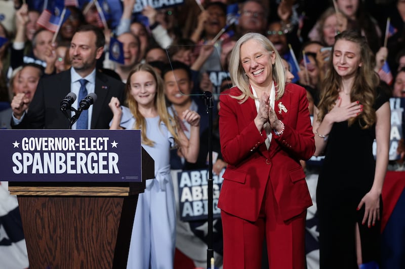 Virginia Democratic gubernatorial candidate Abigail Spanberger celebrates with her family as she takes the stage during her election night rally at the Greater Richmond Convention Center on November 04, 2025 in Richmond, Virginia after being projected the winner of the race. During her speech, she thanked supporters and congratulated her opponent on a hard fought race.