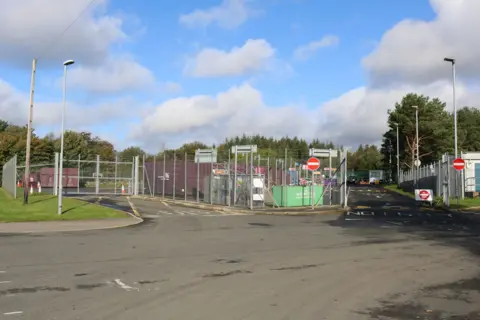 Billy McCrorie A household waste recycling centre with gates around it and no entry signs at one side