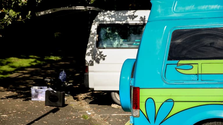 Campers in the carpark. 