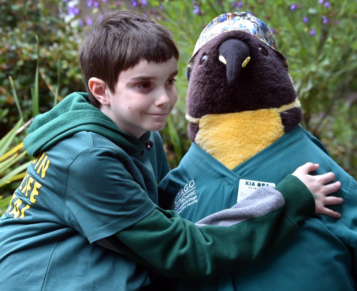 Penguin visit fulfills boy’s lifelong dream