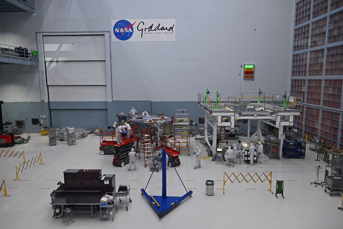Workers in clean suits are pictured in the Roman Telescope assembly room at Goddard Space Flight Center in Greenbelt, Maryland, last year.