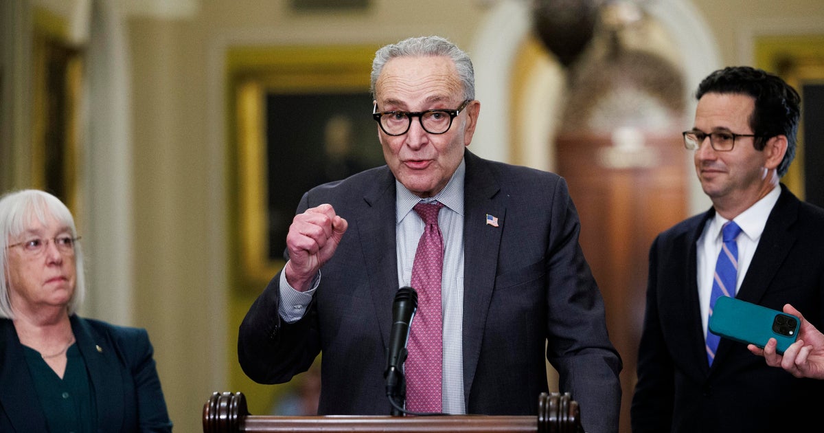 Senate Minority Leader Chuck Schumer, flanked by Sens. Patty Murray and Brian Schatz, speaks to reporters on Nov. 4, 2025, at the Capitol.