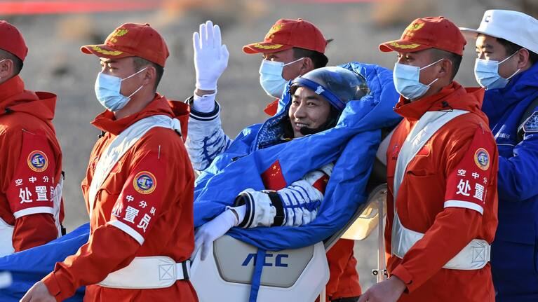 In this photo released by Xinhua News Agency, Wang Jie, a Shenzhou-20 astronaut, returns on the Shenzhou-21 spaceship's return capsule.