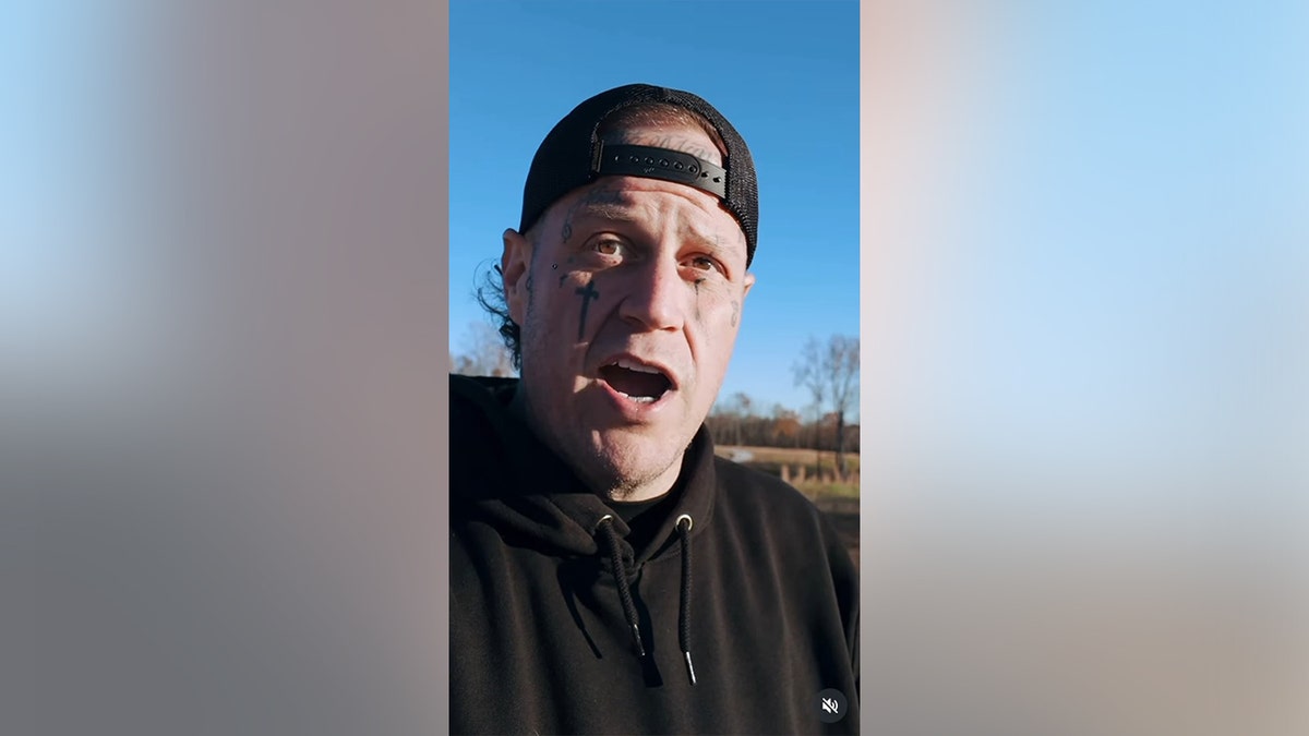 Jelly Roll speaking to the camera with a clean-shaven face