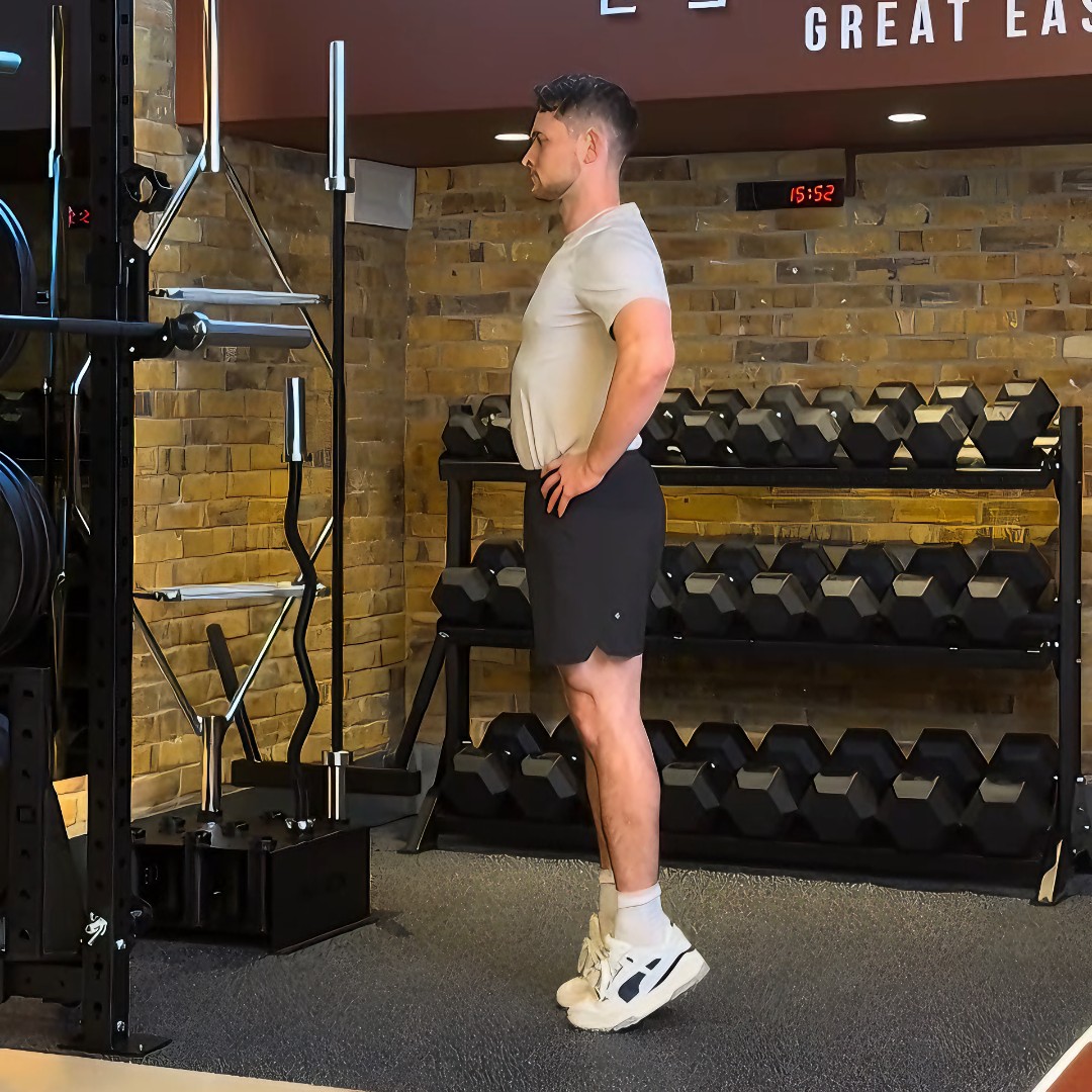 Man balancing on the balls of his feet