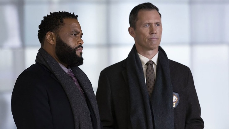Detective Kevin Bernard (Anthony Anderson) and Detective Frank Cosgrove (Jeffrey Donovan) interrogate someone on Law & Order