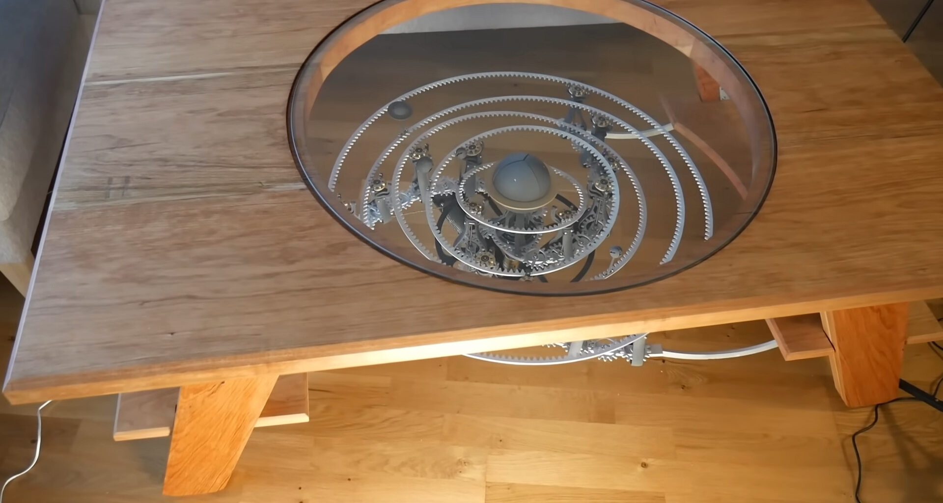 An Improbable, Doomed Star System In A Clockwork Coffee Table