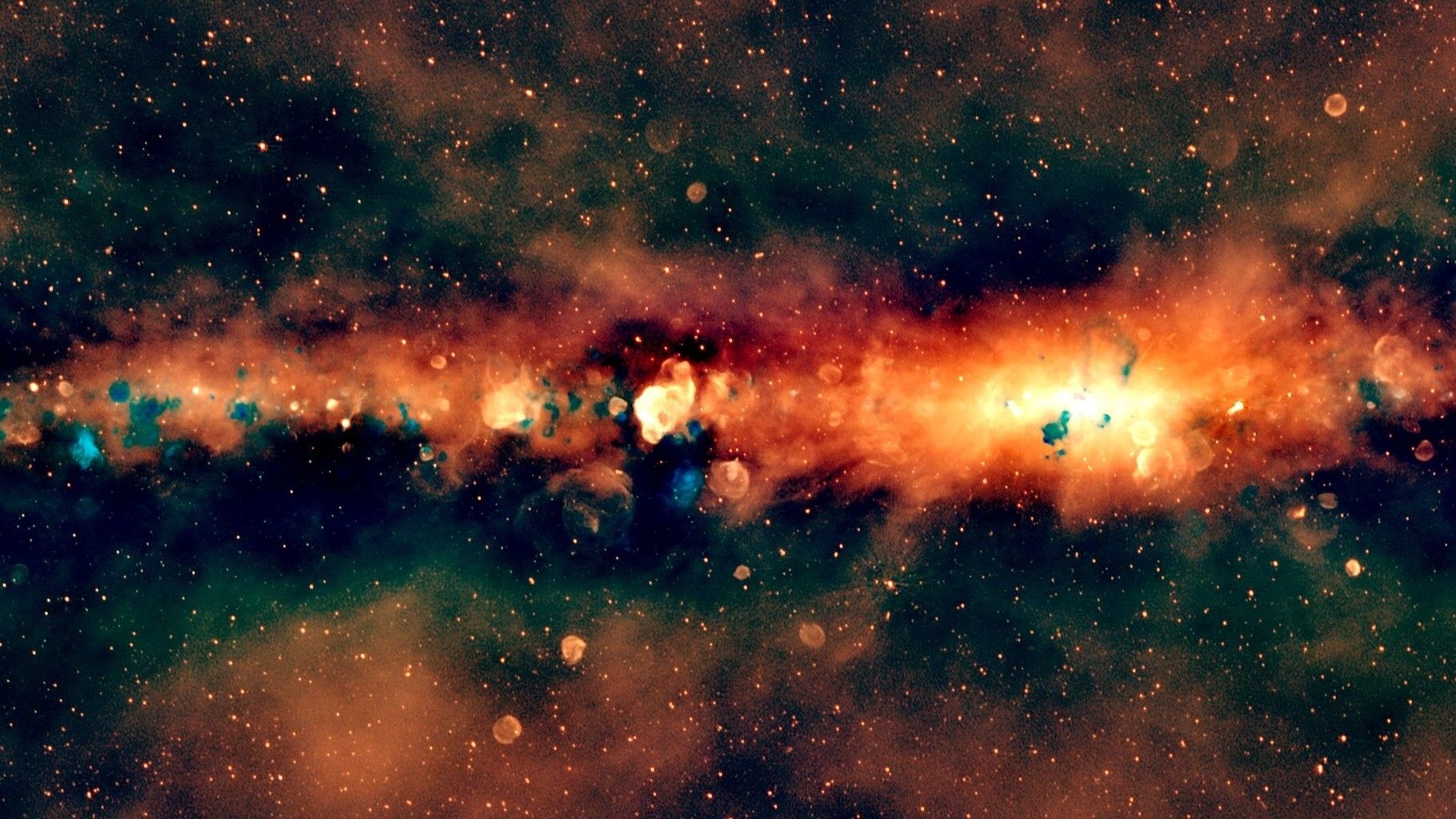 A view of starry outer space with an orange cloudy band in the middle