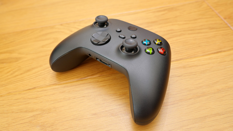 Xbox controller on a wooden table