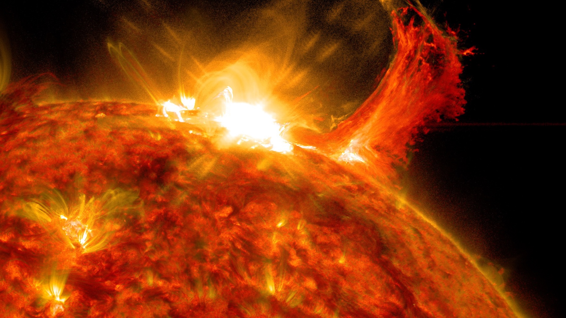 an image of a solar flare emerging from the sun