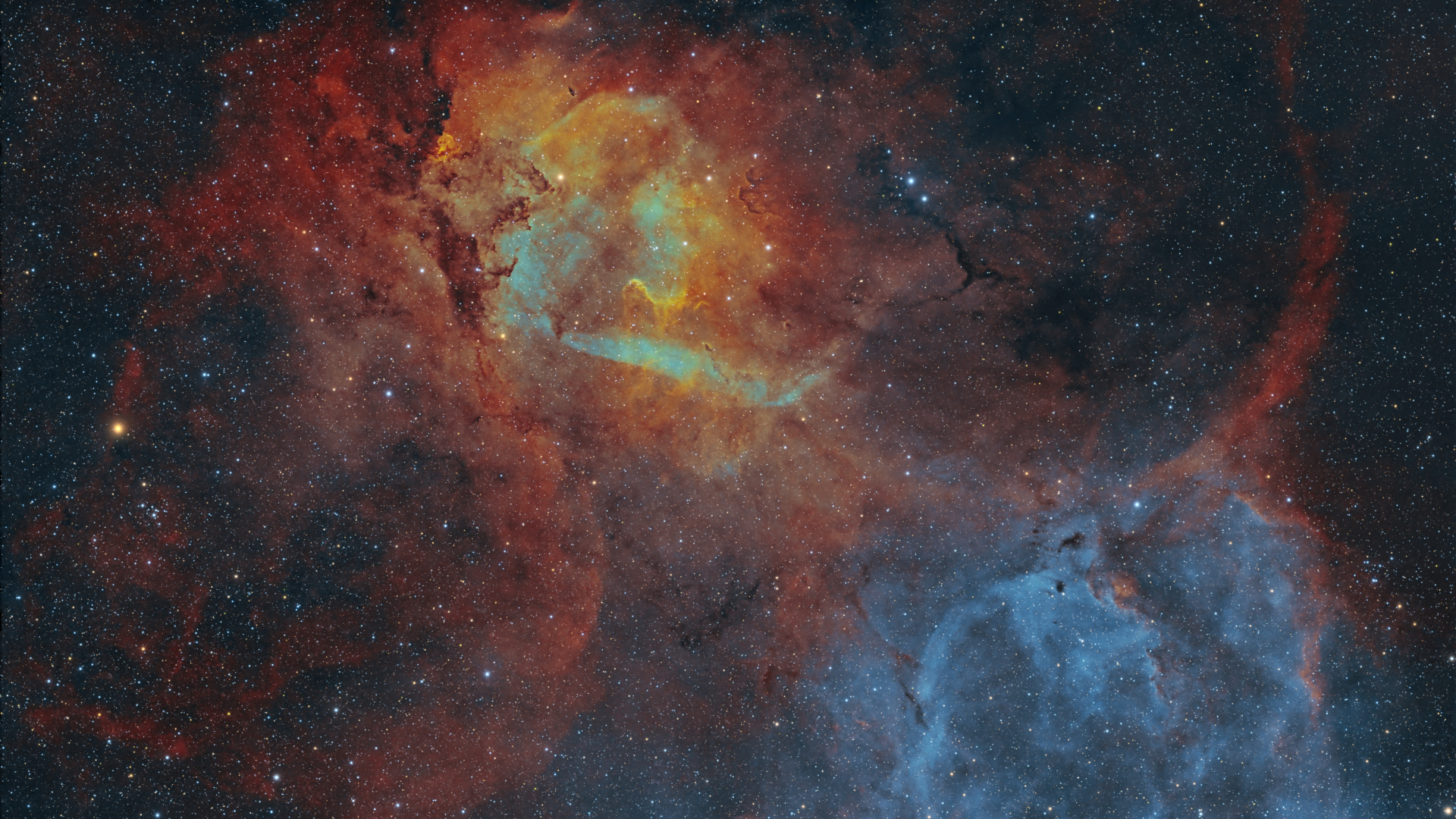 A chaotic nebula scene that appears to take on the appearance of a cosmic lion roaring in deep space against a sea of stars.