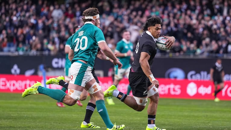 Wallace Sititi runs in for his try against Ireland.