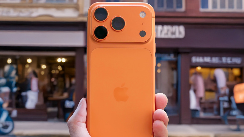 A close-up of an iPhone 17 Pro in hand.
