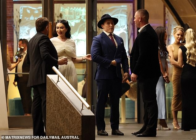 The elite guest list included celebrity lawyer Bryan Wrench, who donned his signature double-breasted suit for the occasion - a look he's often seen sporting in court