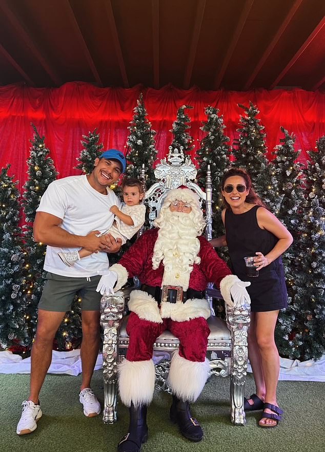 Married At First Sight favourites Johnny and Kerry Balbuziente also shared a festive family moment as they posed with Santa alongside their young son