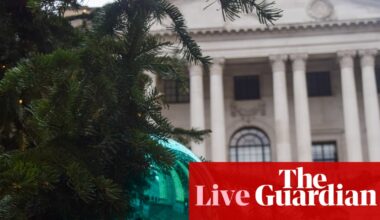 FTSE 100 closes near record high as Santa Rally builds, despite weak retail sales – as it happened | Business