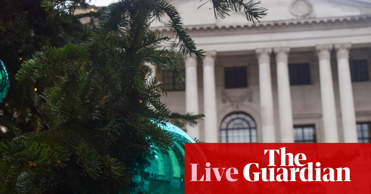 FTSE 100 closes near record high as Santa Rally builds, despite weak retail sales – as it happened | Business