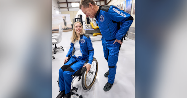 Paraplegic engineer becomes first wheelchair user to blast into space